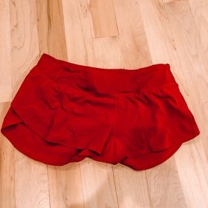red 2” lululemon shorts